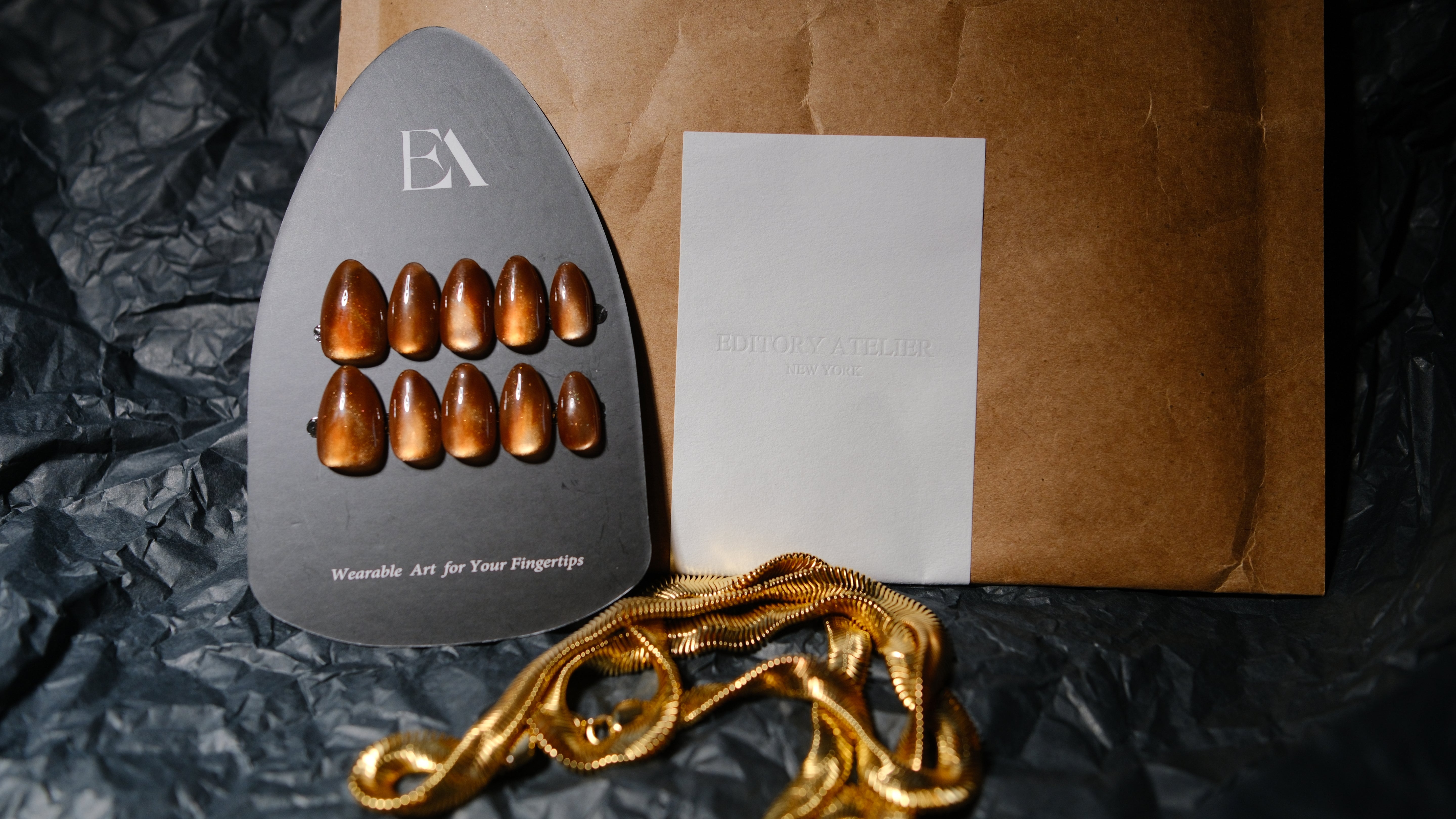 Burnt Amber handcrafted press-on nail set by Editory — warm translucent amber finish