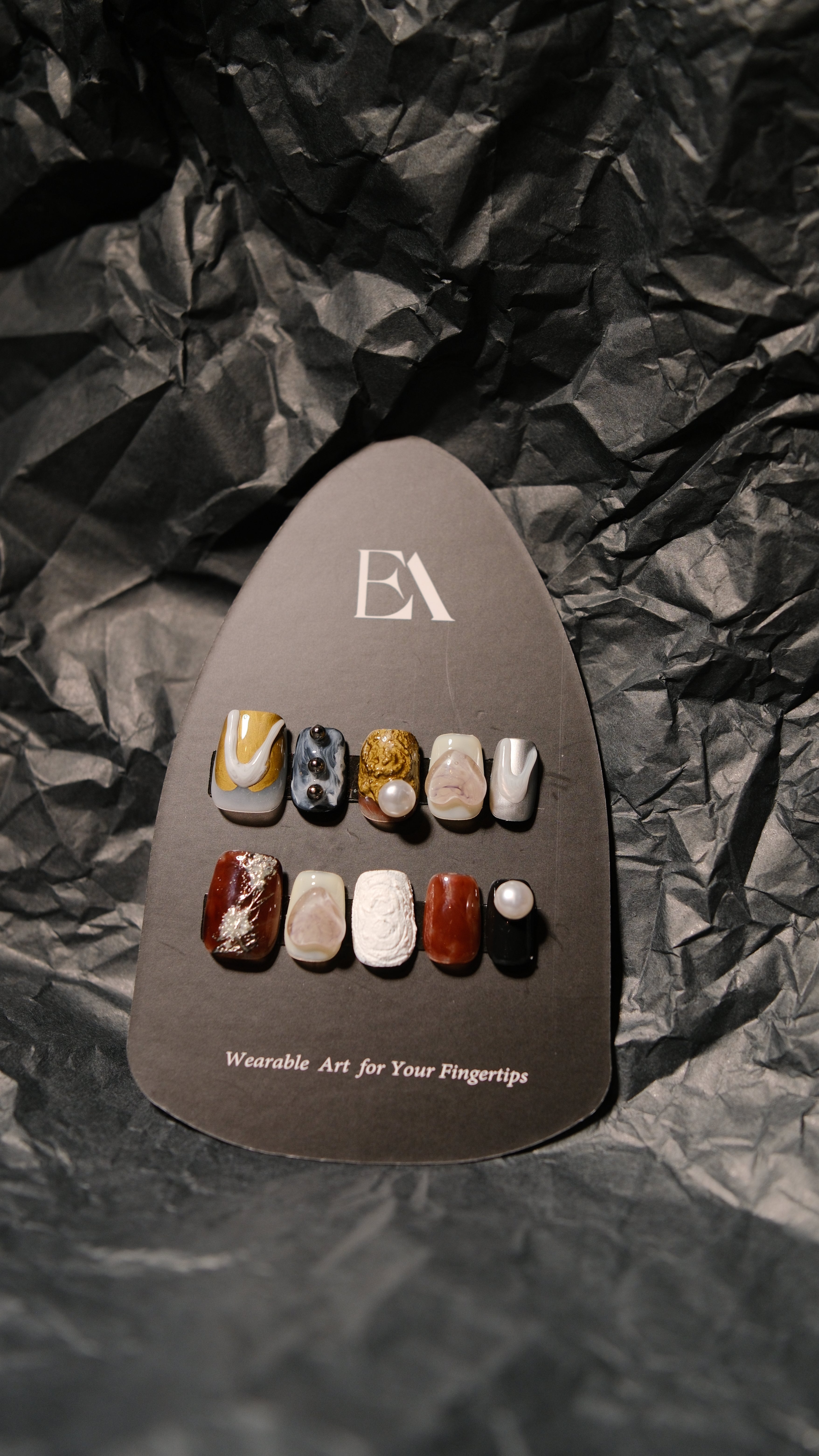 Midnight Relic handcrafted press-on nail set by Editory — marbled stone, obsidian, and pearl accents